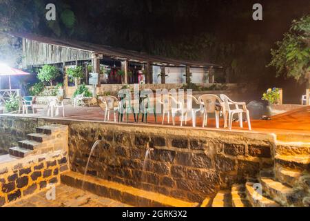 FUENTES GEORGINAS, GUATEMALA - MARCH 21, 2016: Night view of a thermal pool Funtes Georginas. Stock Photo