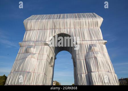 ARC DE TRIOMPHE WRAPPED SUNSET AND NIGHTIME, PARIS Stock Photo