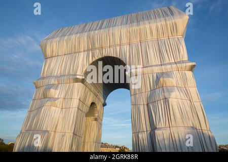 ARC DE TRIOMPHE WRAPPED SUNSET AND NIGHTIME, PARIS Stock Photo