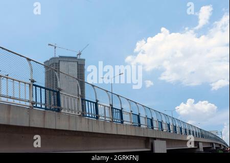 Tall building under construction in the city Stock Photo