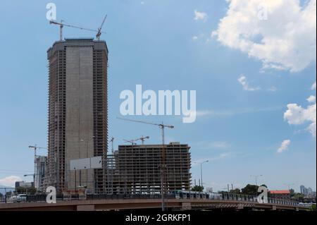 Tall building under construction in the city Stock Photo