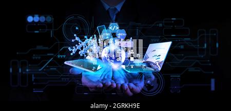 Software Engineer Businessman hands show all innovation technology virtual dashboard and 3d world and elements of innovation concept. Stock Photo