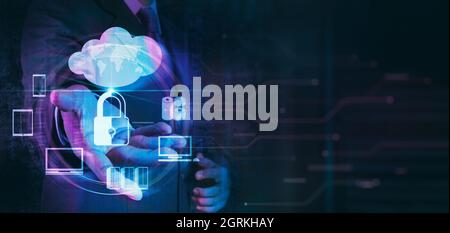 Businessman hand working with a Cloud Computing ,yber security and data protection information privacy internet technology concept.Businessman working Stock Photo
