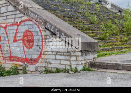 TALLINN, ESTONIA - AUGUST 22, 2016: Ruined stairs at an old Soviet sports and cultural complex Linnahall in Tallinn, Estonia Stock Photo