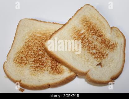 Fresh toast straight out of the toaster. Stock Photo