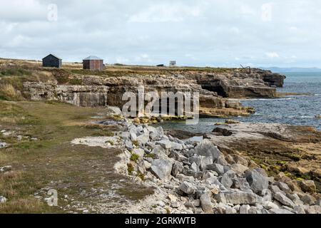 Portland stone along the rocky coastline at Portland Bill, Isle of Portland, Dorset, England, UK Stock Photo