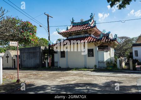 Mausoleums along one of the many streets in the Chinese cemetery, Manila, Philippines. Stock Photo