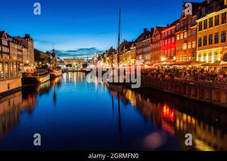 Evening view of Nyhavn district in Copenhagen, Denmark Stock Photo