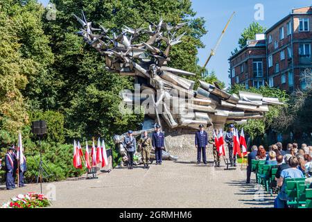 GDANSK, POLAND - SEPTEMBER 1, 2016: Commemorating of Defence of the Polish Post Office on September 1, 1939. Monument to the Defenders in the backgrou Stock Photo