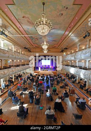 Erfurt, Germany. 01st Oct, 2021. Participants sit in the Kaisersaal during the WikiCon annual conference. This is where Wikipedia's German-speaking volunteer community will meet from October 1 to 3, 2021, to work on current issues and strategic questions about wiki projects. Credit: Martin Schutt/dpa-Zentralbild/dpa/Alamy Live News Stock Photo