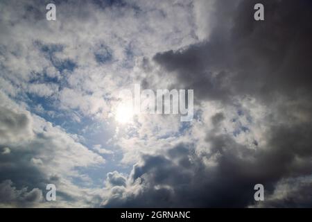 grey incoming storm clouds full frame background Stock Photo