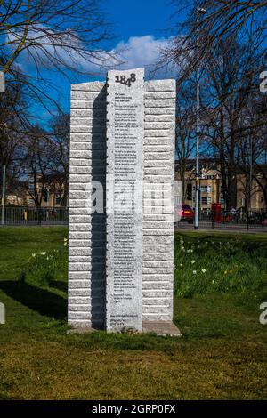 Granite sculpture marking the 'birthplace' of the first set of football rules on Parkers Piece Cambridge England. Stock Photo