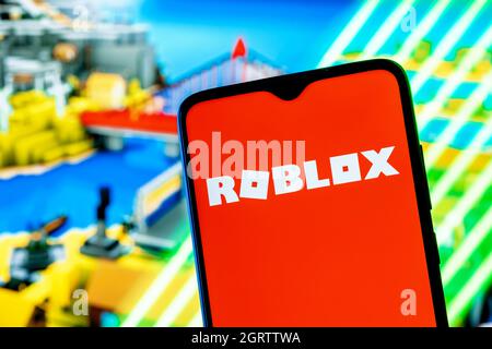 Cali, Colombia - August 15, 2021: Roblox logo on PC screen with keyboard,  mouse and speakers. Roblox is an online game platform and game creation  system. Stock Photo