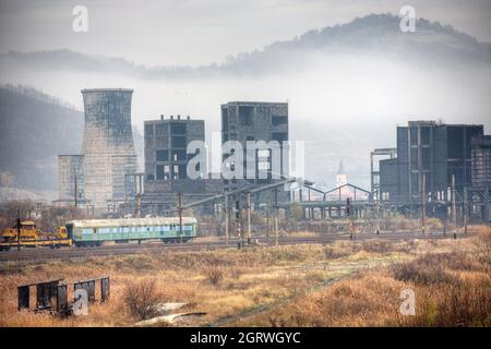 Abandoned and ruined carbon black factory. Remains of communism at Copsa Mica, Romania Stock Photo