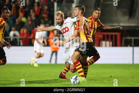 Standard's Joao Klauss De Mello and Mechelen's Jordi Vanlerberghe fight for the ball during a soccer match between KV Mechelen and Standard de Liege, Stock Photo