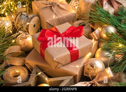 Christmas composition with gift boxes and Christmas decorations close-up. Side view. Stock Photo