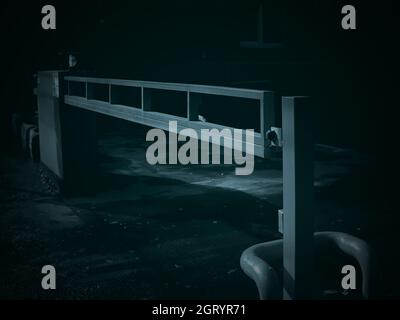 Automatic gate barrier. Tinted image of a closed barrier Stock Photo