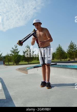 Dobrograd, Vladimir region, Russia. 29 July 2017. Teen with scooter in the skatepark Stock Photo