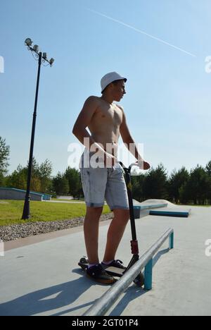 Dobrograd, Vladimir region, Russia. 29 July 2017. Teen on scooter in the skatepark Stock Photo