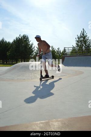 Dobrograd, Vladimir region, Russia. 29 July 2017. Teen on scooter in the skatepark Stock Photo