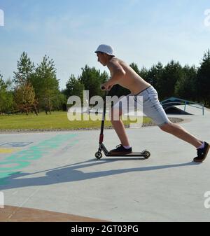 Dobrograd, Vladimir region, Russia. 29 July 2017. Teen on scooter in the skatepark Stock Photo