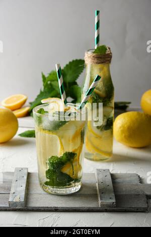 Summer Refreshing Drink Lemonade With Lemons, Mint Leaves, Lime In A Glass, Next To