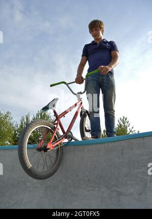 Dobrograd, Vladimir region, Russia. 29 July 2017. Teen with BMX bike in the skatepark Stock Photo