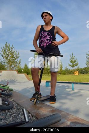 Dobrograd, Vladimir region, Russia. 29 July 2017. Teen on scooter in the skatepark Stock Photo