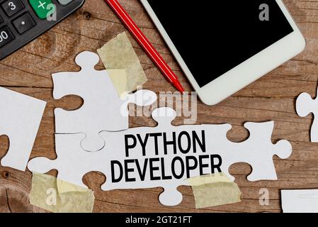 Writing displaying text Python Developer. Business concept responsible for writing serverside web application logic Building An Unfinished White Stock Photo