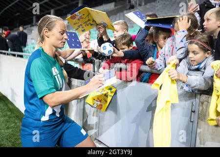 Ljubljana, Slovenia. 01st Oct, 2021. Former top Slovenian Alpine skier Tina Maze signs autographs for children after a charity football match in Ljubljana. Top former and recent Slovenian athletes, members of the Slovenian Olympic Team and former Slovenian and international soccer stars participated in a traditional charity football match in Ljubljana to raise funds for Sponsorship in Sport, an initiative helping young athletes from underprivileged backgrounds. The match is sponsored by Aleksander Ceferin, President of The Union of European Football Associations, who also participated in the m Stock Photo