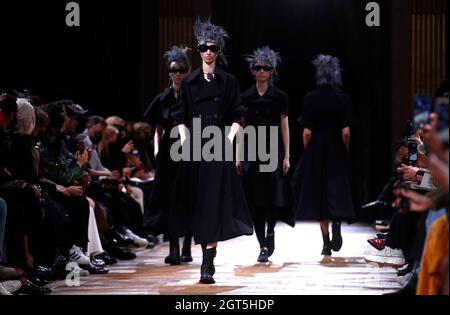 Paris, France. 2nd Oct, 2021. Models present creations from the Spring/Summer 2022 Ready to Wear collection by Yohji Yamamoto during the Paris Fashion Week, in Paris, France, Oct. 1, 2021. Credit: Xinhua/Alamy Live News Stock Photo