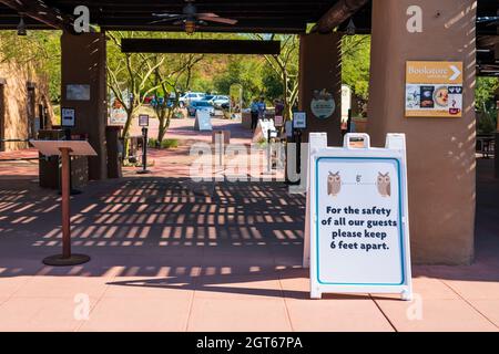 Six feet apart sign board in public area Stock Photo