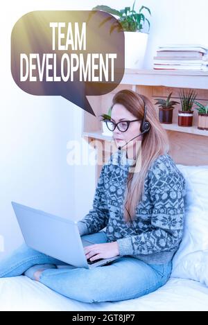 Text caption presenting Team Development. Business approach learn why and how small groups change over time with graphs Student Learning New Things Stock Photo