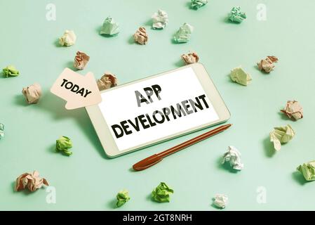Hand writing sign App Development. Concept meaning Development services for awesome mobile and web experiences Brainstorming Technology Problems Stock Photo