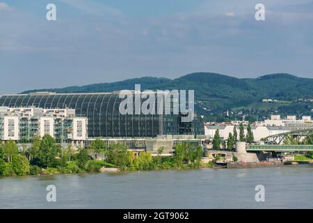 01 June 2019 Vienna, Austria - Handelskai railway and underground station. View from Danube river. Sunny summer morning Stock Photo