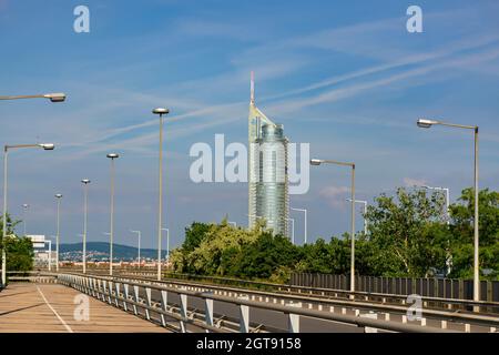 01 June 2019 Vienna, Austria - Millennium Tower on Danube river, modern business centre in Vienna. Sunny summer morning Stock Photo