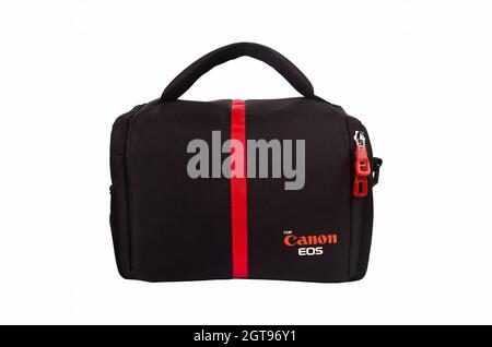 Canon EOS digital cameras designed for red striped black bag, isolated on a white background, October 24, 2020 Istanbul Turkey Stock Photo