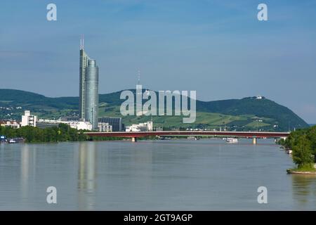 01 June 2019 Vienna, Austria - Millennium Tower on Danube river, modern business centre in Vienna. Sunny summer morning Stock Photo