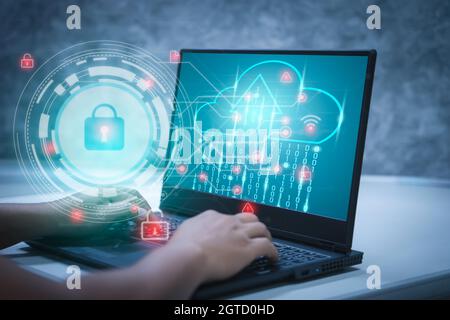 Businessmen work from home on a computer with a keyhole icon for personal access security systems. the concept of cyber information data and privacy o Stock Photo