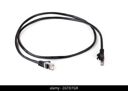 Simple short RJ-45 network patch cable coiled, internet cable, object isolated on white background, cut out. Ethernet plug connection, networking equi Stock Photo