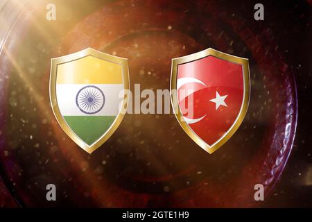 india and turkey flag in golden shield on copper texture background.3d illustration. Stock Photo