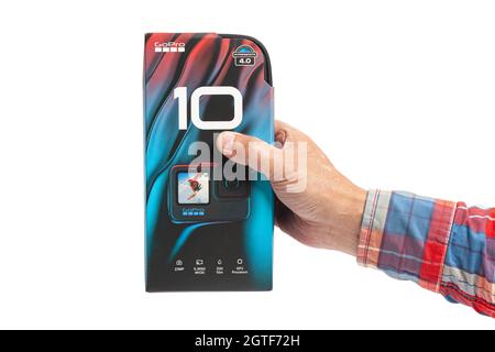 Moscow, Russia, October 02,2021 GoPro HERO10 Black Edition on white background hold in hand Stock Photo