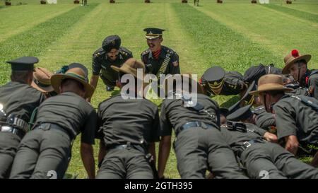 Dehradun, Uttarakhand India August 15, 2021. Indian army officers celebrate after passing out a parade at Indian Military Academy IMA.  Stock Photo