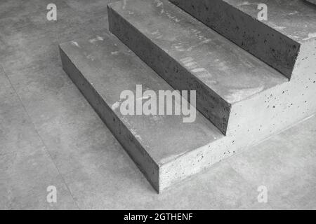 Grey concrete staircase in modern contemporary minimalistic interior Stock Photo