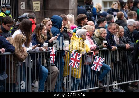 Edinburgh, Scotland, UK. 2nd Oct, 2021. PICTURED: Her Majesty The Queen officially opens the Scottish Parliament with a heavy police presence along with numerous security forces and the British Army standing guard. The streets were lined with well wishers some seen waving Union Jack flags and people taking pictures on their camera phones. Charles and Camilla then departed by the royal helicopter. Credit: Colin Fisher/Alamy Live News Stock Photo