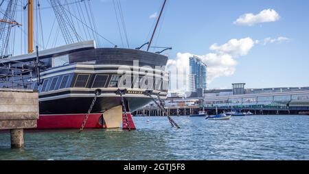 HMS Warrior, Britain's first iron-hulled, armoured battleship, moored at Portsmouth Dockyard, Hampshire, UK on 29 September 2021 Stock Photo