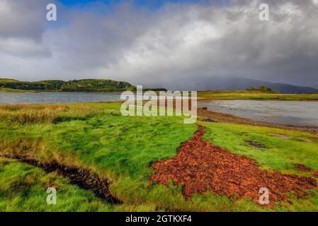 The sheltered bay at Port Ramsay on The Isle of Lismore in Argyll, Scotland Stock Photo