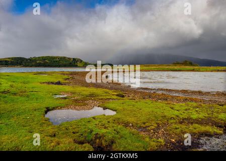 The sheltered bay at Port Ramsay on The Isle of Lismore in Argyll, Scotland Stock Photo