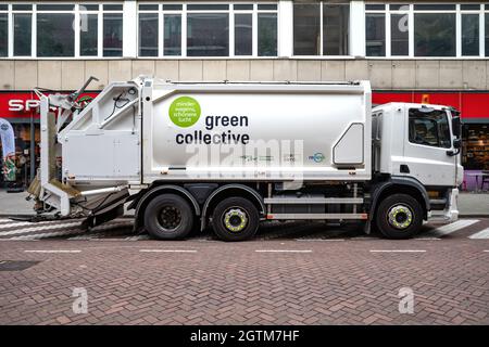 green collective garbage truck Stock Photo