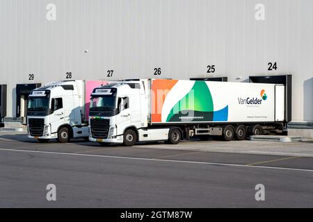 Van Gelder trucks at loading dock Stock Photo